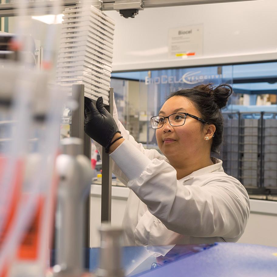 Female scientist in automation lab