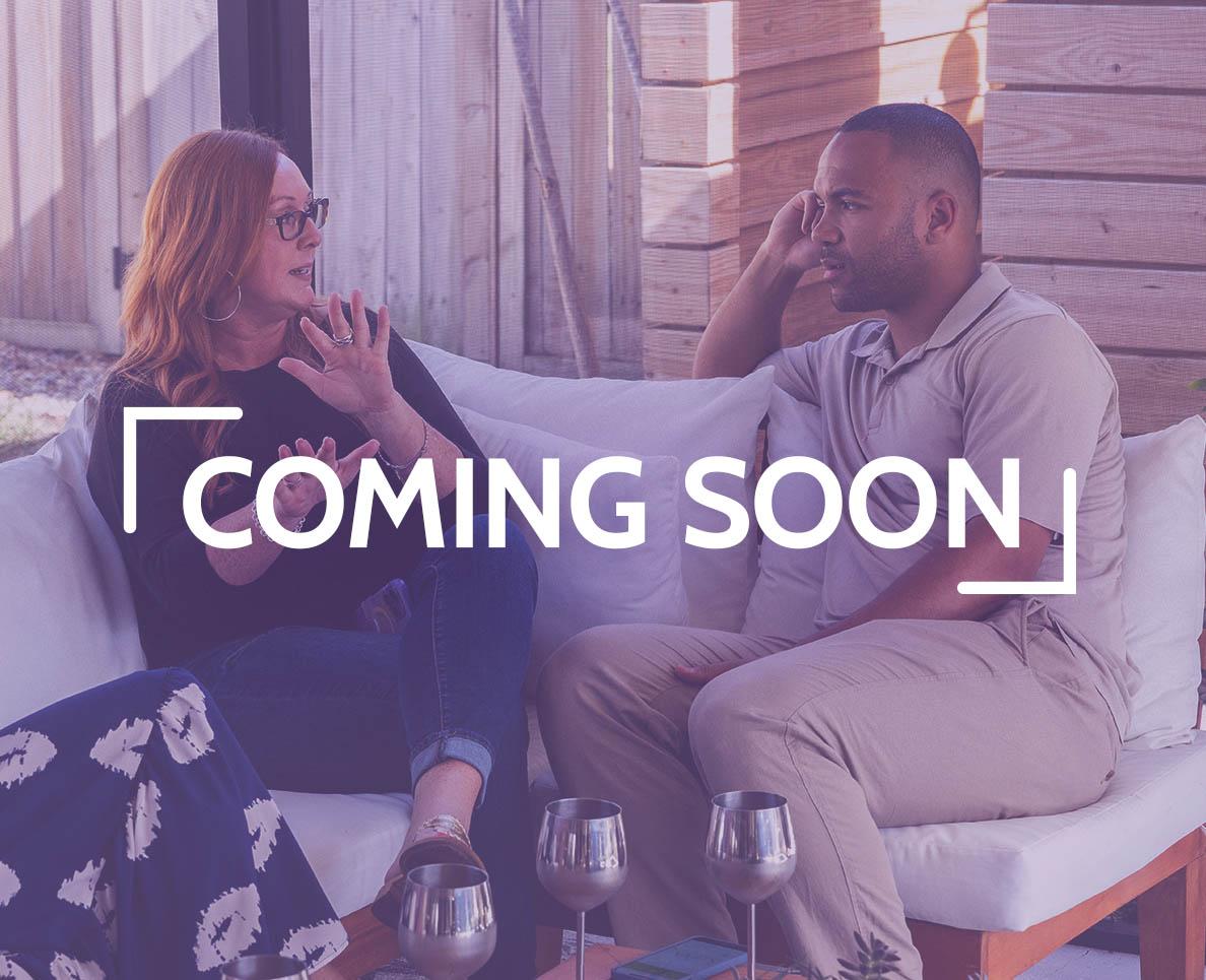 An image of Reece and Michelle sitting on a couch talking with a purple overlay and text reading "COMING SOON"