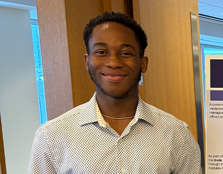Pierre, a Vertex Science Leaders Scholarship Recipient, smiling at the camera