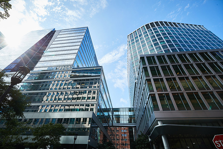 An image looking up at the Vertex Pharmaceuticals headquarters in Boston, Mass.