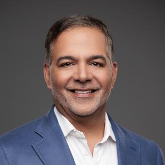 An image of Amit K. Sachdev, Executive Vice President, Chief Patient and External Affairs Officer at Vertex Pharmaceuticals