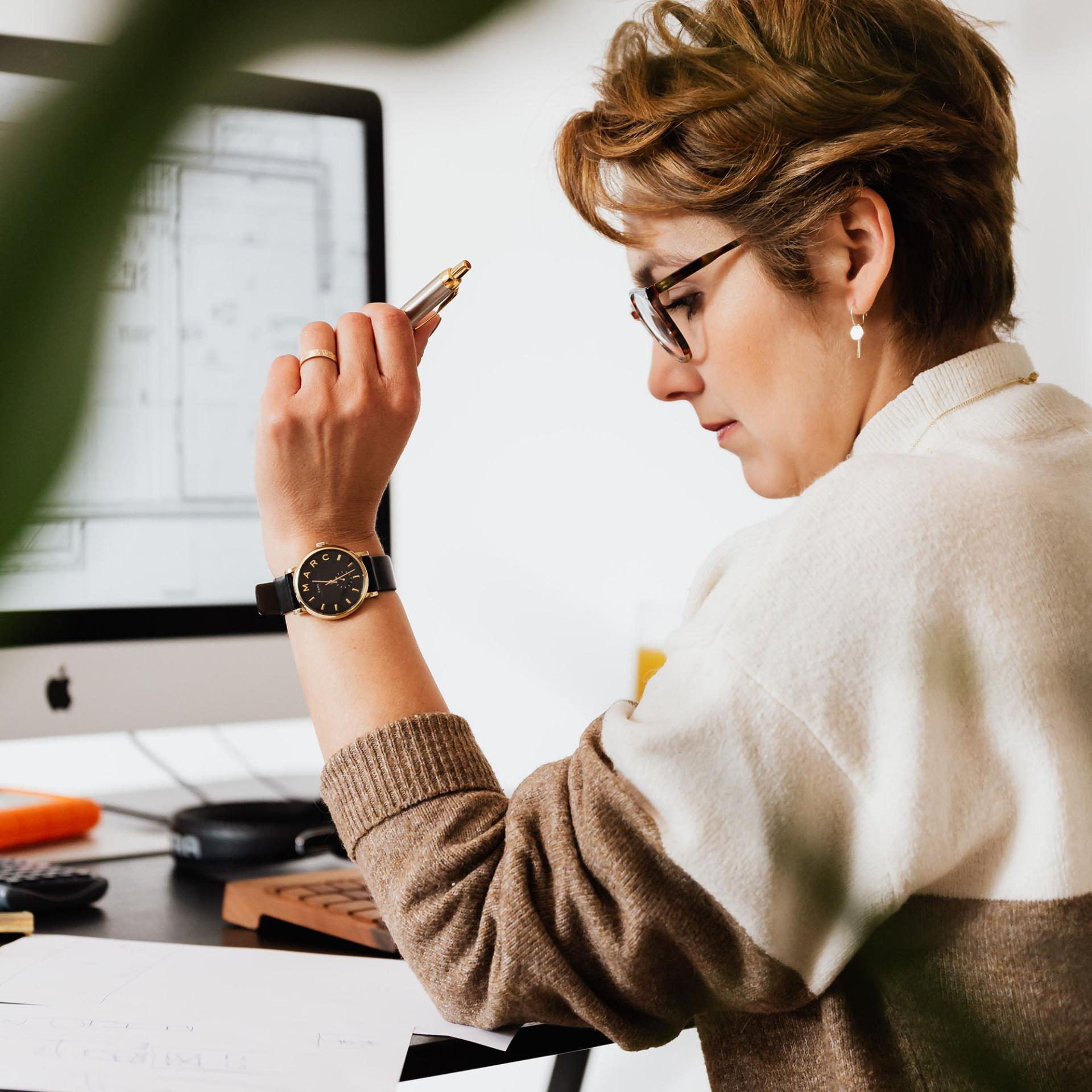 woman working at computer monitor