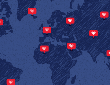 A map of the globe with hearts in various locations