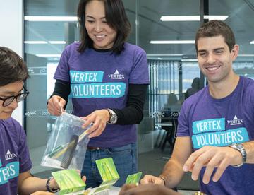 An image of Vertex four Vertex employees volunteering during Day of Service
