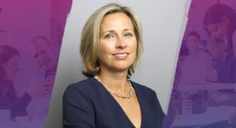 An image of Stephanie Franklin, Chief Human Resource Officer at Vertex Pharmaceuticals, with purple watercolor designs on either side of her