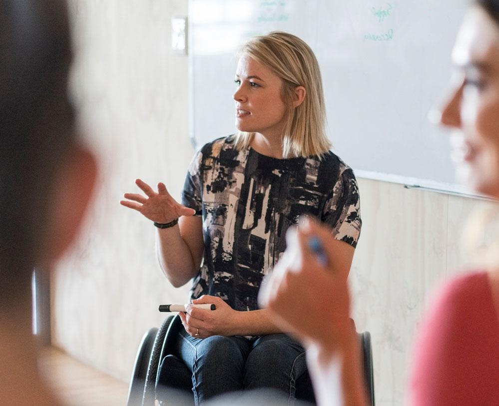 Female businesswoman speaking in meeting