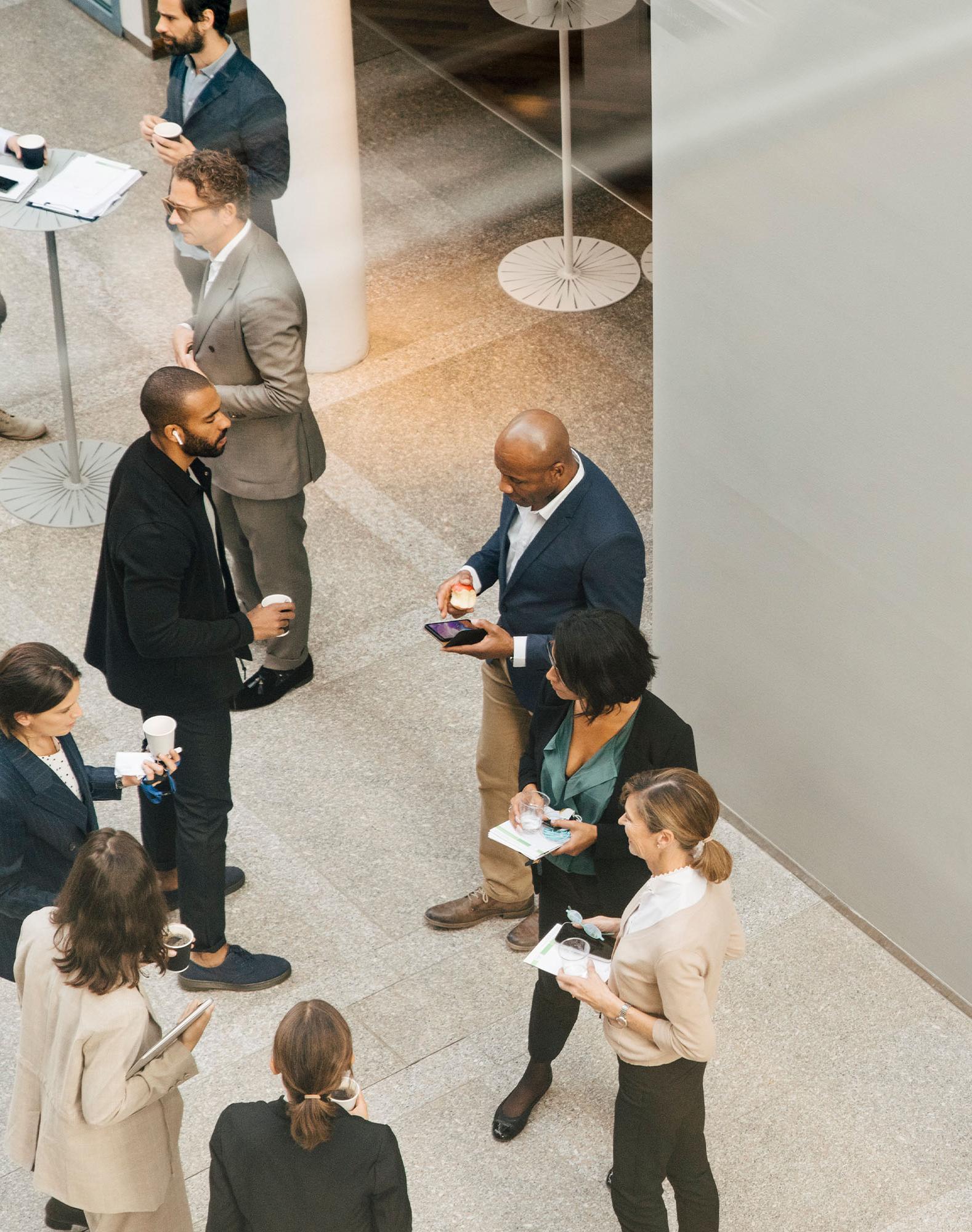 A view from above as businesspeople gather and have conversations