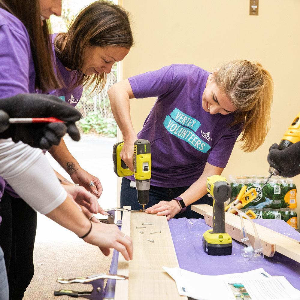 Volunteers from Vertex working on a community project